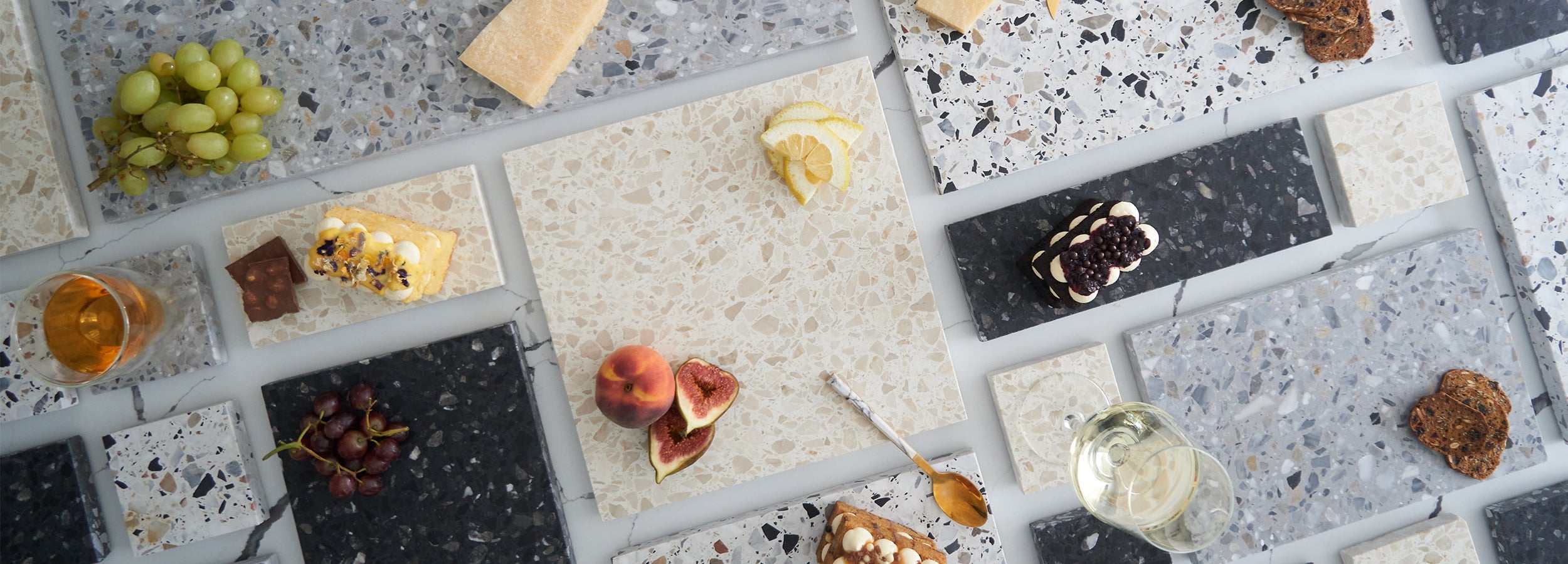 Mix of Insieme Homewares terrazzo servingware, tableware and decor range 