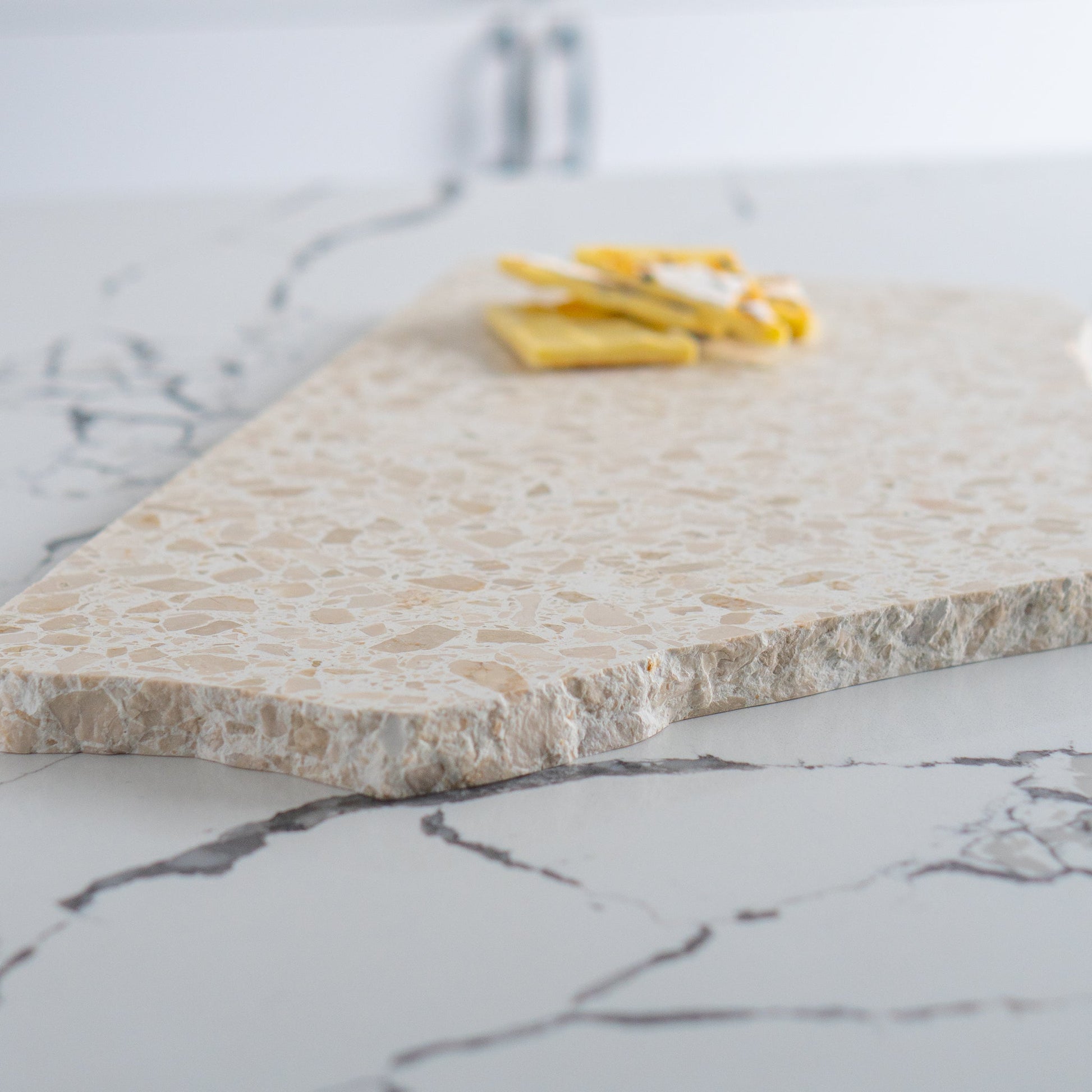 Insieme Homewares Extra Large Organic Terrazzo Platter in Estate — expansive, uniquely shaped, handcrafted from Italian terrazzo in soft, neutral hues, perfect for elegant displays.