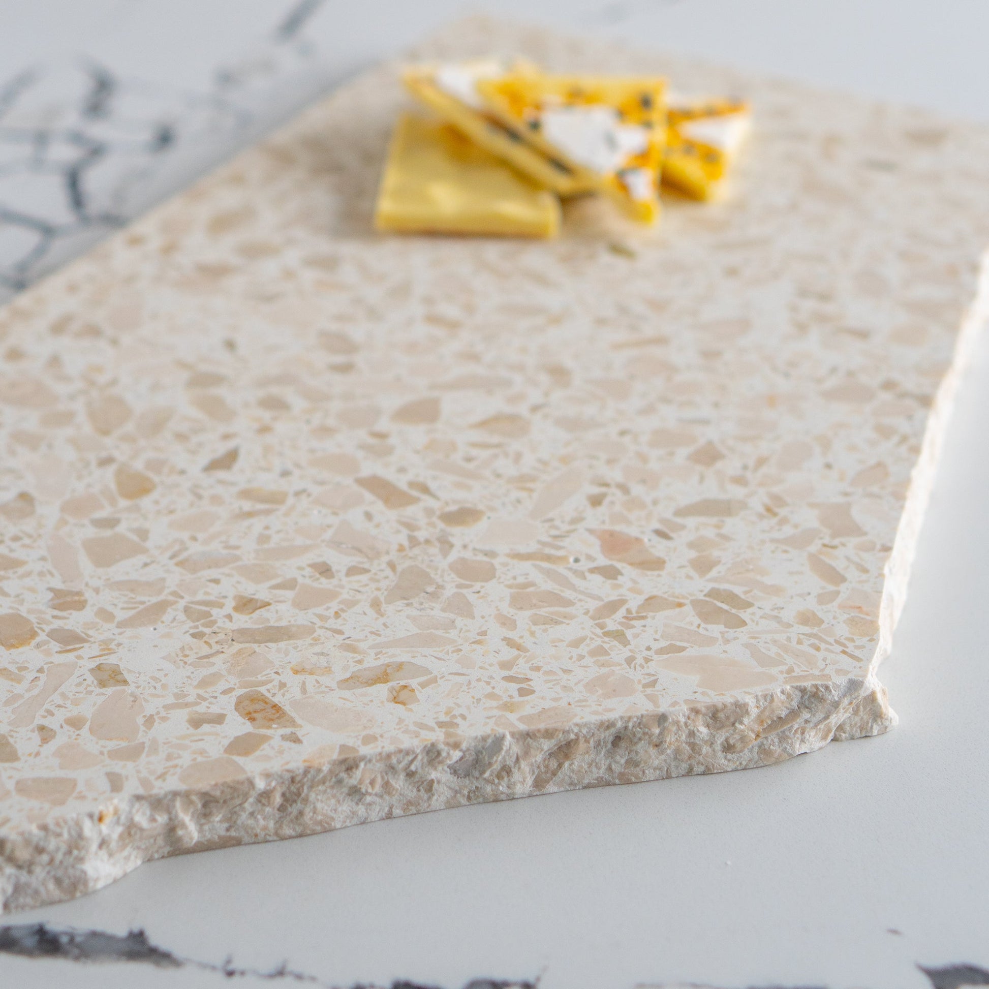 Insieme Homewares Extra Large Organic Terrazzo Platter in Estate — expansive, uniquely shaped, handcrafted from Italian terrazzo in soft, neutral hues, perfect for elegant displays.
