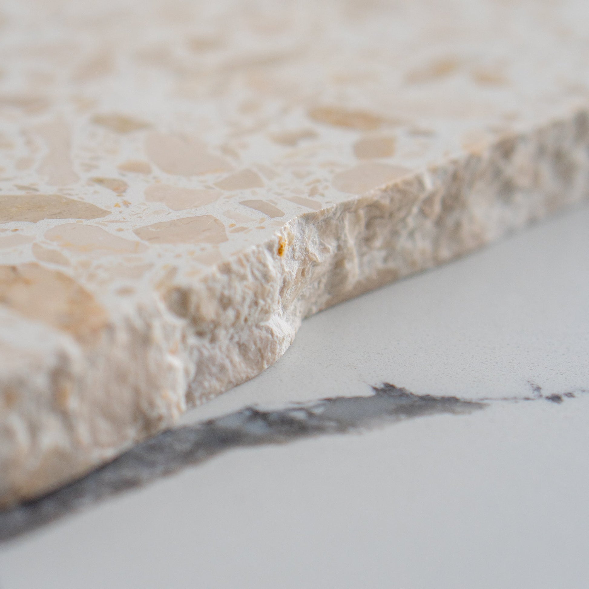 Insieme Homewares Extra Large Organic Terrazzo Platter in Estate — expansive, uniquely shaped, handcrafted from Italian terrazzo in soft, neutral hues, perfect for elegant displays.