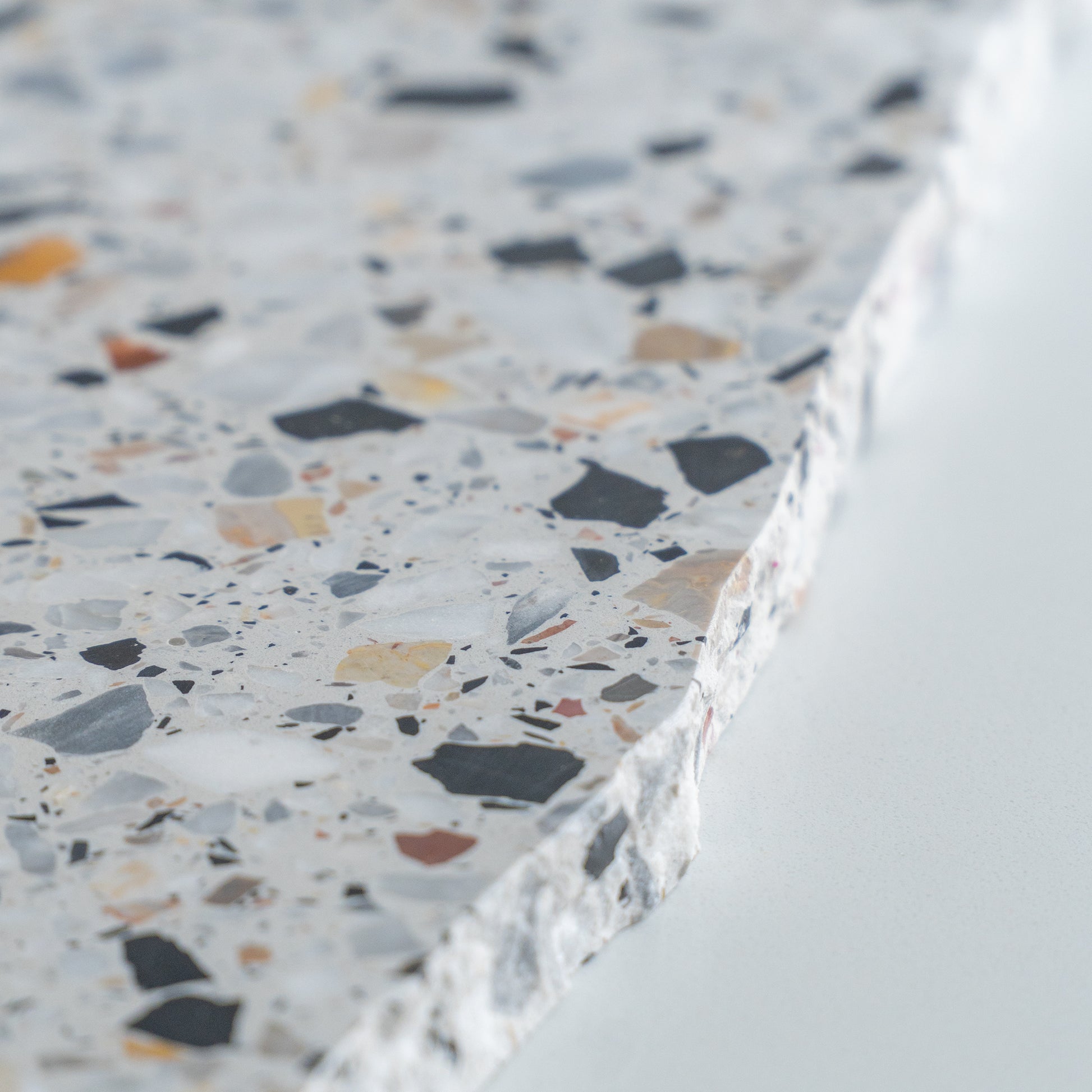 Insieme Homewares Extra Large Organic Terrazzo Platter in Autunno — expansive, uniquely shaped, handcrafted from Italian terrazzo in warm, earthy tones, ideal for grand presentations or as a statement piece.