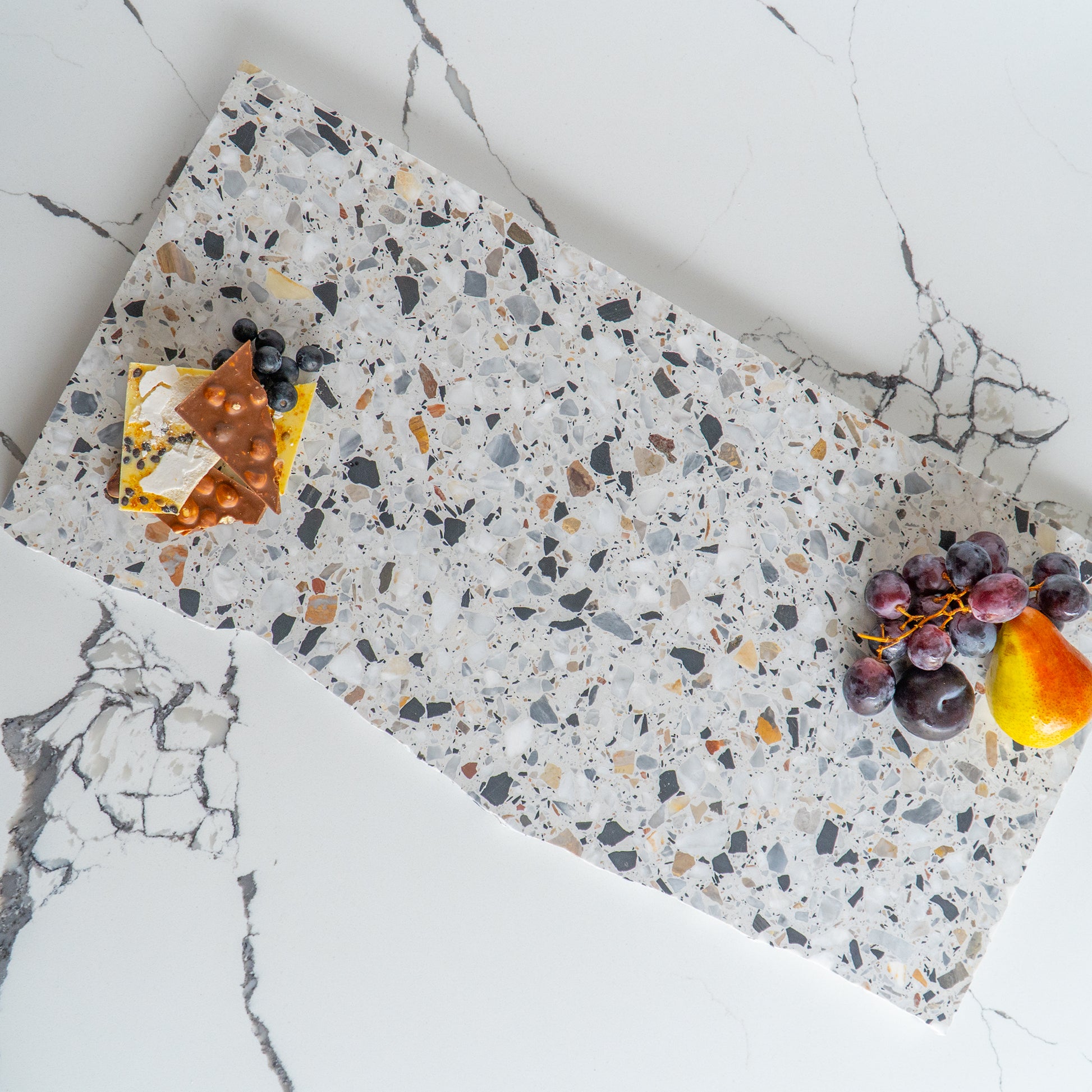 Insieme Homewares Extra Large Organic Terrazzo Platter in Autunno — expansive, uniquely shaped, handcrafted from Italian terrazzo in warm, earthy tones, ideal for grand presentations or as a statement piece.
