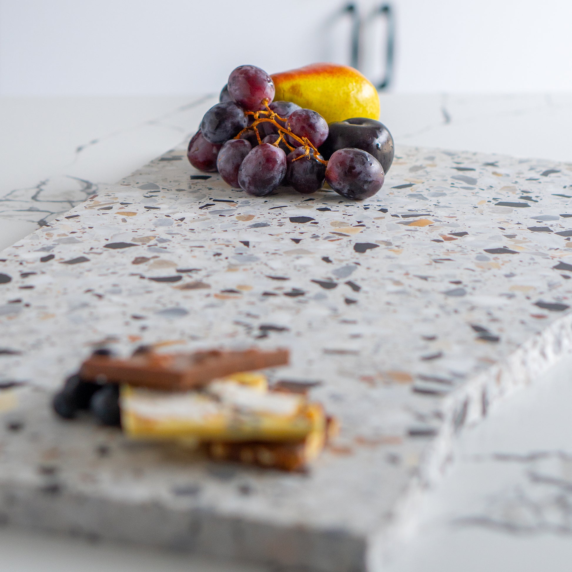 Insieme Homewares Extra Large Organic Terrazzo Platter in Autunno — expansive, uniquely shaped, handcrafted from Italian terrazzo in warm, earthy tones, ideal for grand presentations or as a statement piece.
