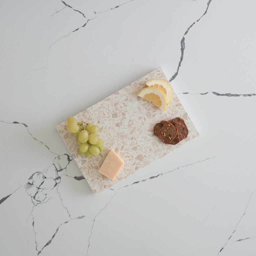 Medium terrazzo platter in Estate — perfect for serving meals or displaying décor.