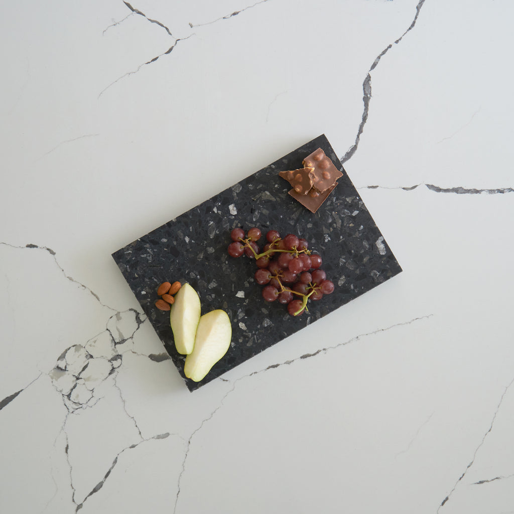 Medium terrazzo platter in Inverno — perfect for serving meals or displaying décor.