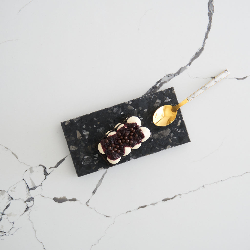 Inverno terrazzo small dish designed to brighten styling setups or serve small bites.